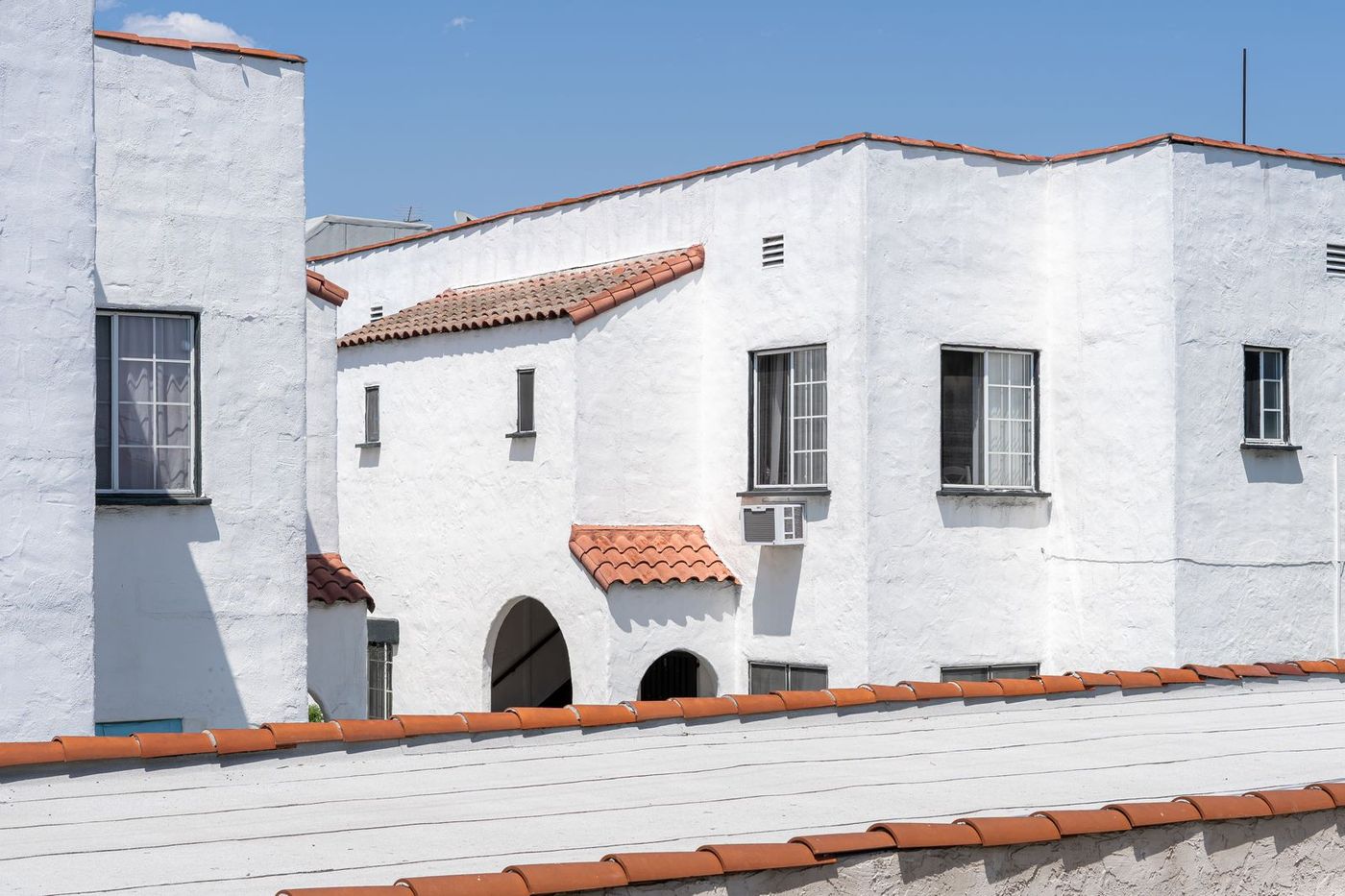Exterior white stucco · Eleven Home design + build