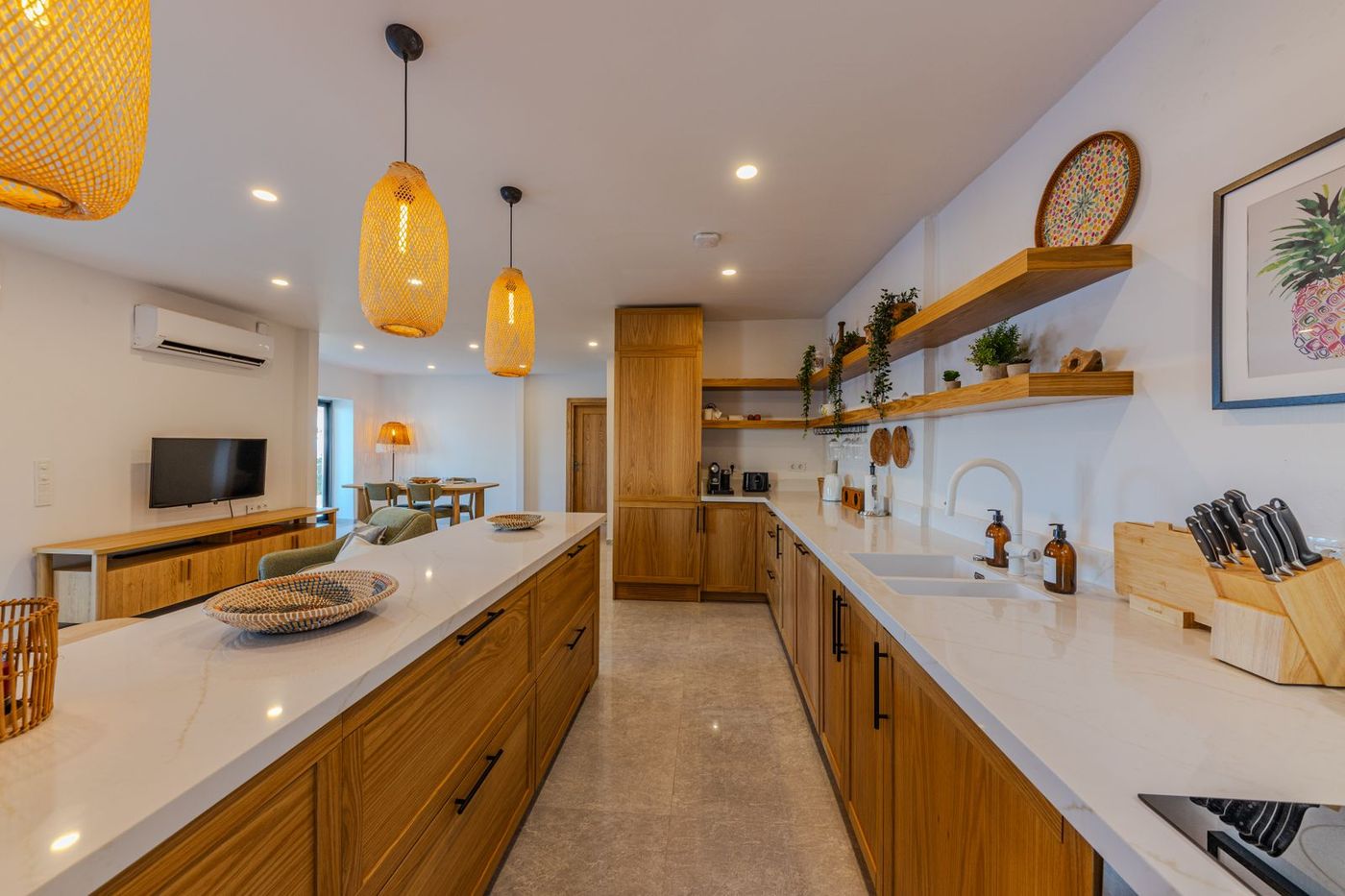 Oak kitchen with rattan pendants